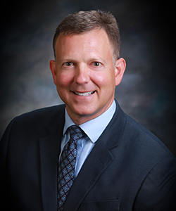 Professional headshot of John P. Armato, CPA and managing partner of Darnall, Sikes & Frederick’s Morgan City office.